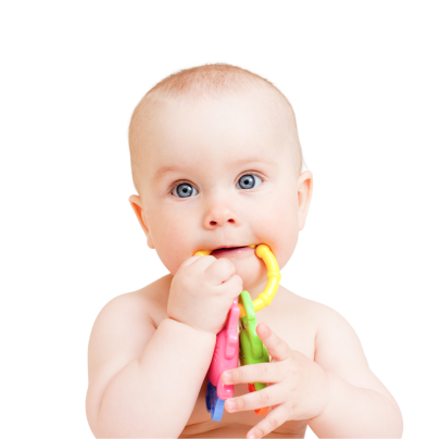A baby with blue eyes holds and chews on a colorful teething toy, looking slightly upward against a plain white background.